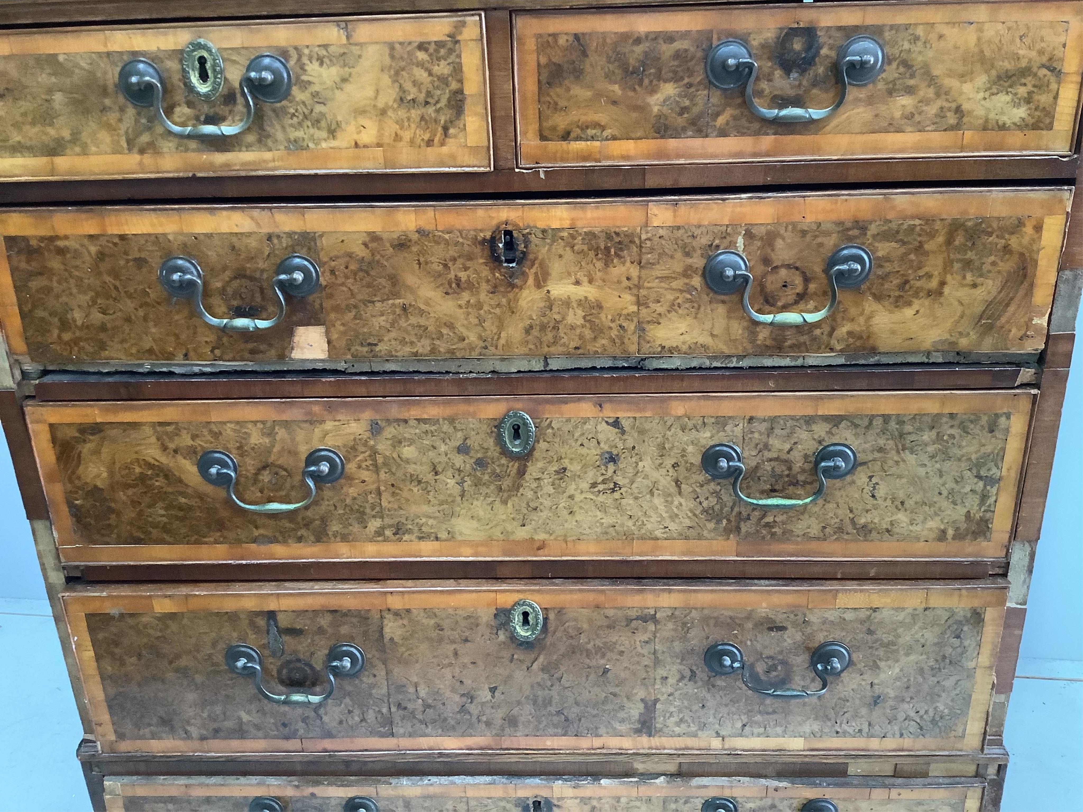 A mid 18th century and later crossbanded walnut and oak chest, width 95cm, height 103cm. Condition - poor